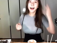 Korean Babe Touching Her Tits Through Fabric